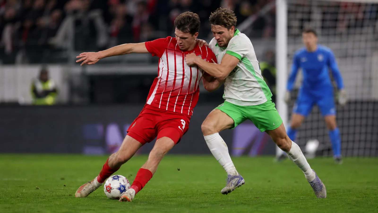 Freiburg Wolfsburg - duel dans la surface pendant le match de Bundesliga 2026