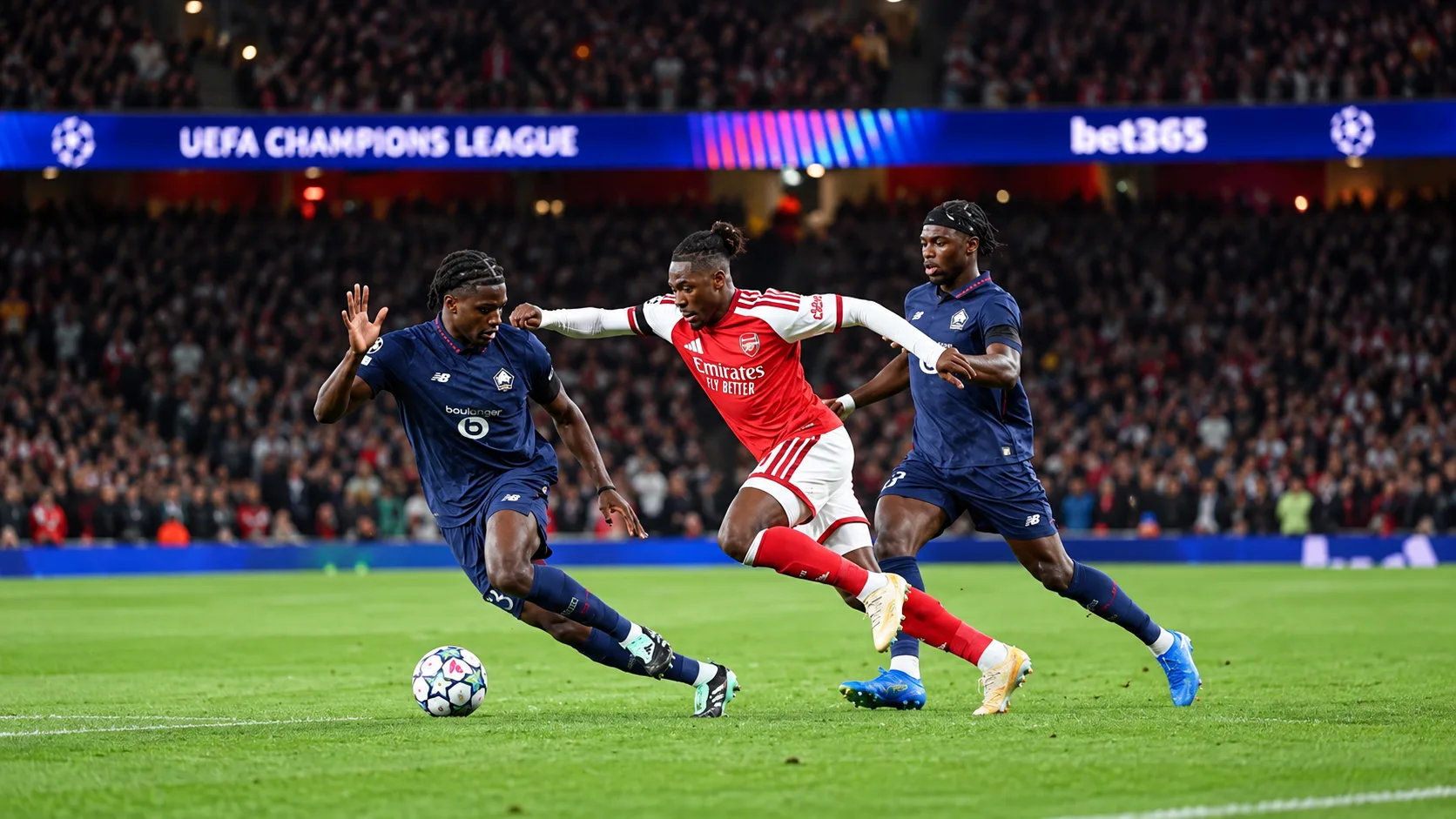 Ballon immobile près de la ligne médiane et joueurs d’Arsenal et de Lille répartis sur la pelouse.